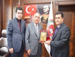 Turgutcan’a  vefa plaketi